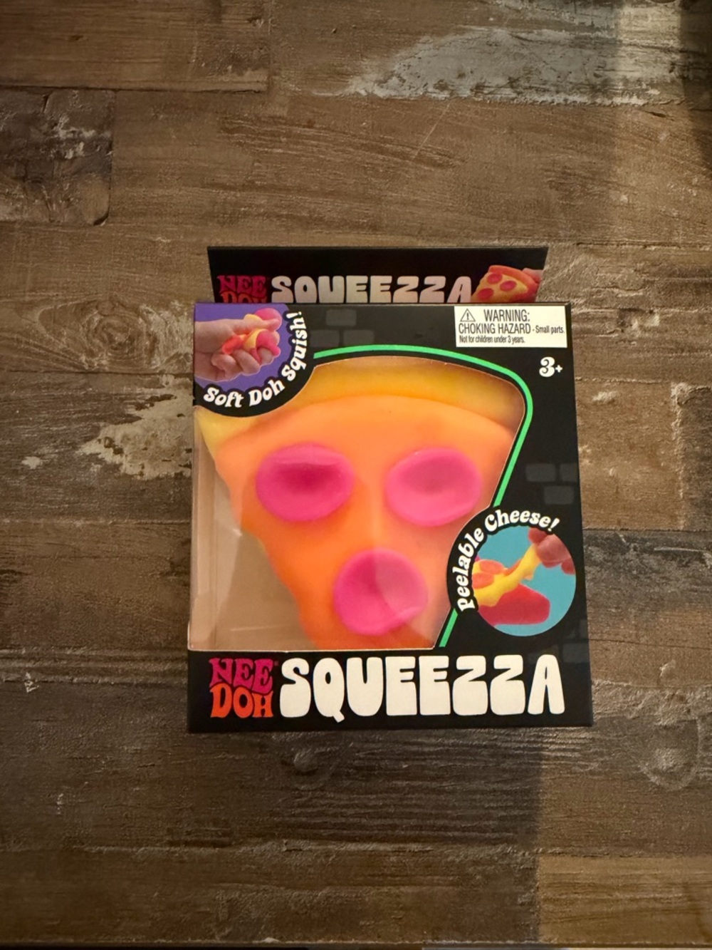 Needoh Squeeza Pizza Slice Toy - Orange with Pink Toppings